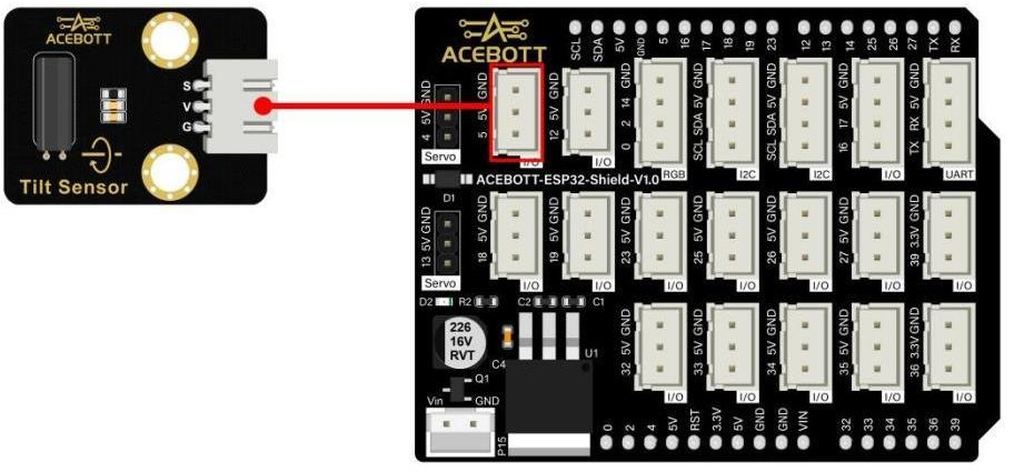 3ACEBOTT QB123 Tilt Sensor module connected to an ESP32 expansion board showing VCC, GND and signal pin connections