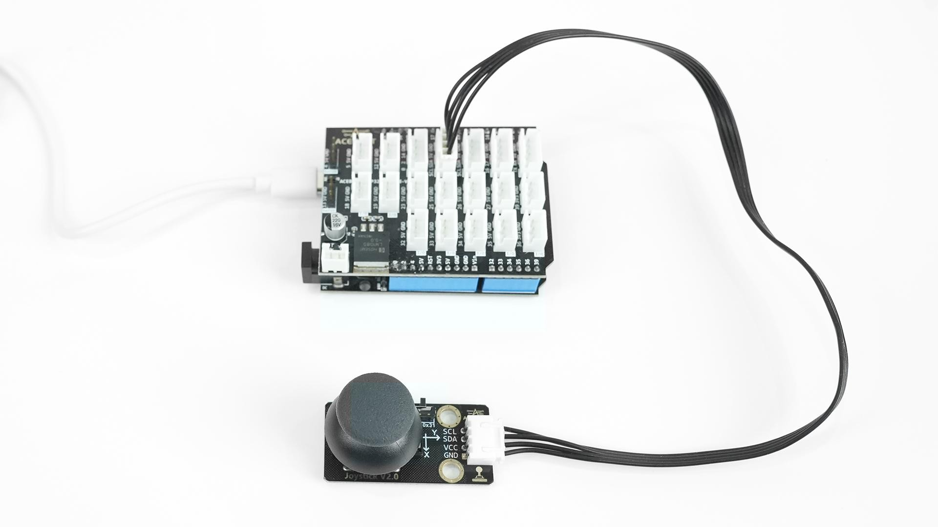4ACEBOTT QB122 Joystick Module connected to an ESP32 controller board with cable for joystick input testing