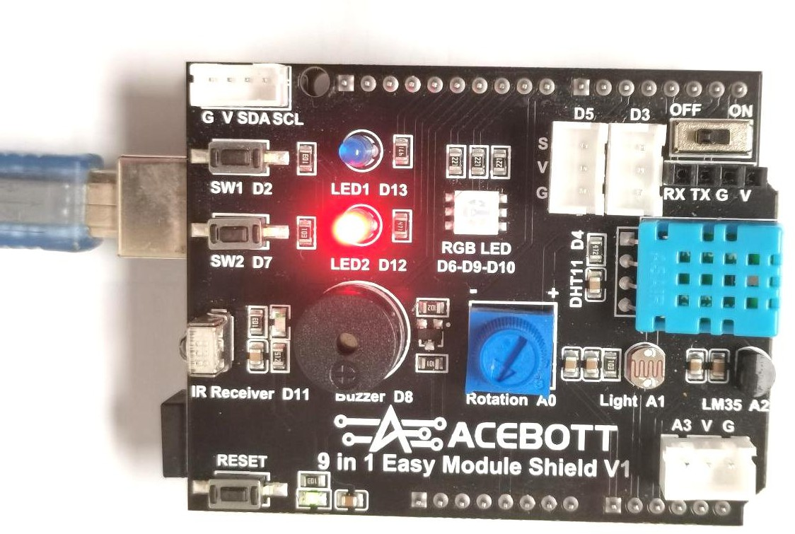 7 ACEBOTT 9 in 1 Easy Module Shield with the Rotation A0 potentiometer set to the far left position and highlighted by a yellow circle