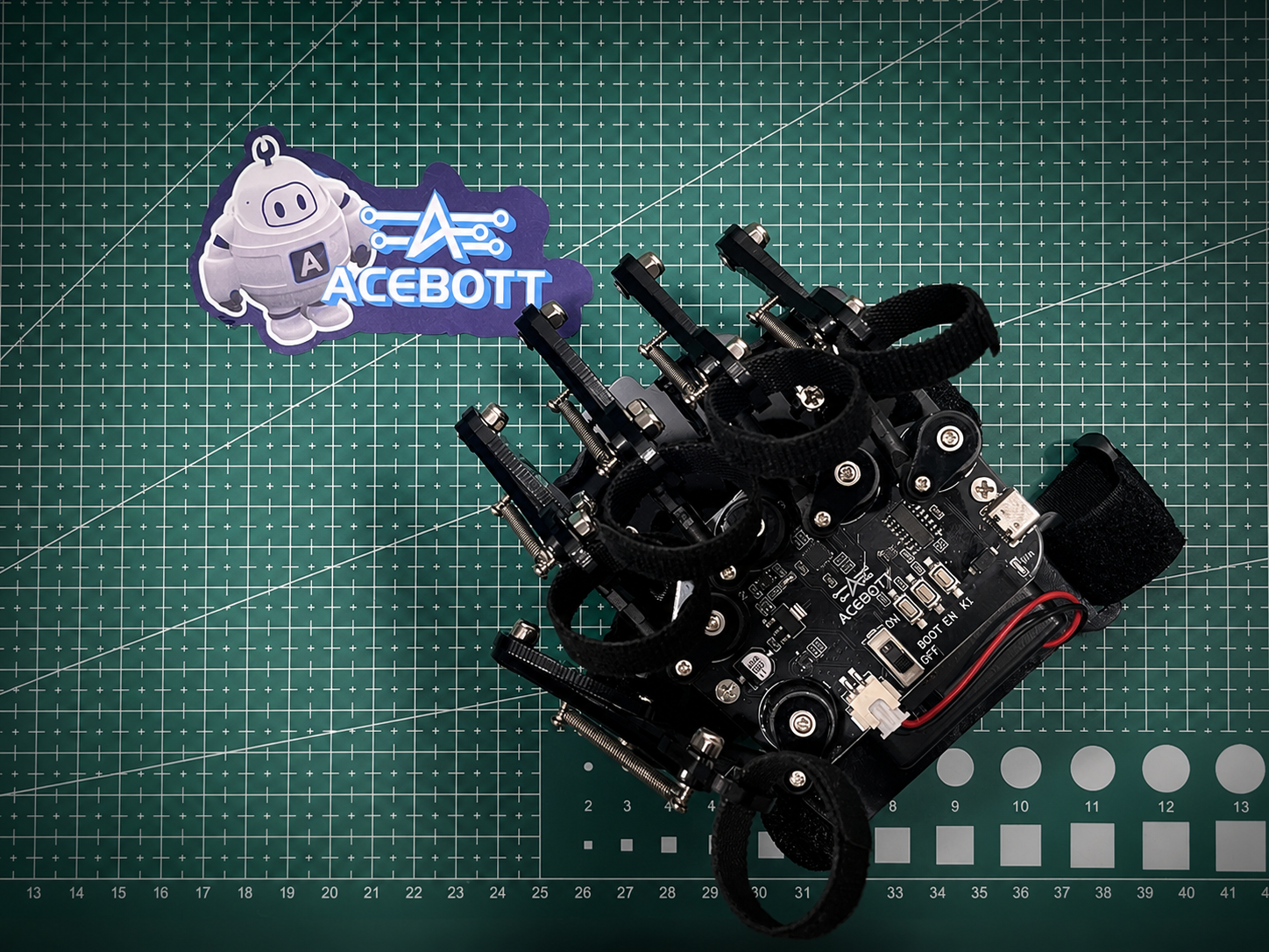 ACEBOTT QD023 Motion Sensing Glove assembled on a workbench