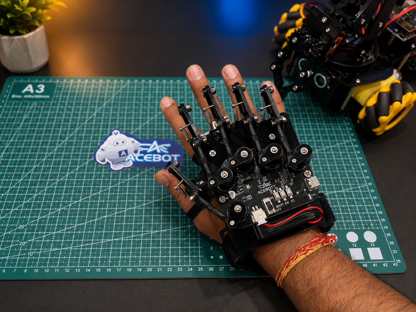 Student wearing the ACEBOTT QD023 Motion Sensing Glove for gesture control